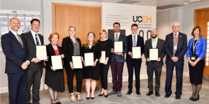 The twelve Associate Fellows